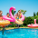 Lifestyle photo of kids jumping into a pool with floaties 