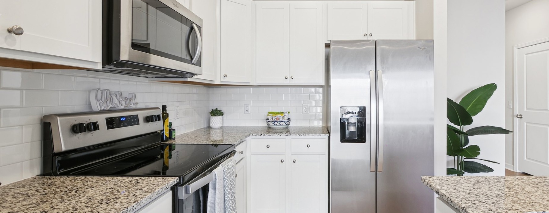 Modern townhome kitchens with stainless steel appliances at Easthaven